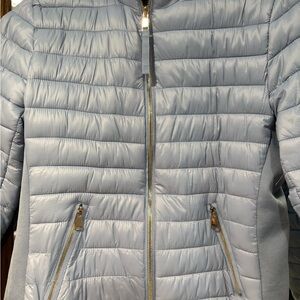 Pretty blue light jacket size large. Never worn